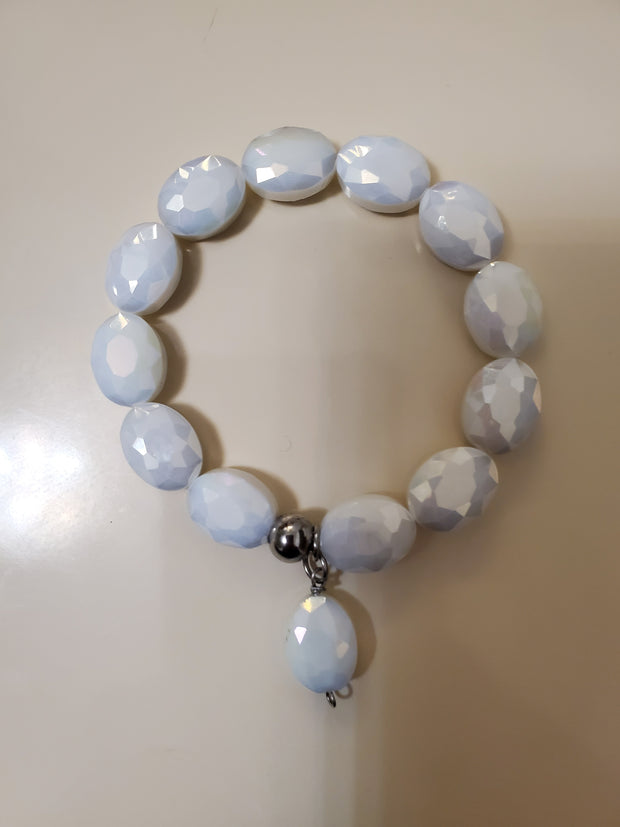 White glass beads with glass charm stretch