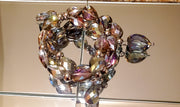 Purplish Crystal glass beads with crystal glass charms and the bracelets stretch