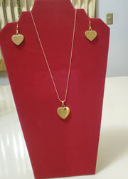 Necklaces are gold plated over sterling silver and the stainless steel pendants are Ankh cross and a heart